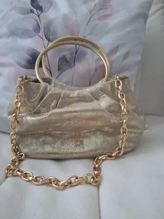 Bolso de fiesta dorado con cadena