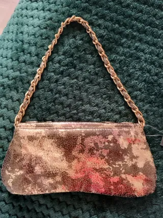 Bolso de fiesta dorado y marrón