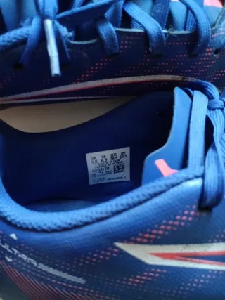 Scarpe da calcio Puma blu e rosse