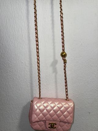 Bolso Chanel rosa y dorado
