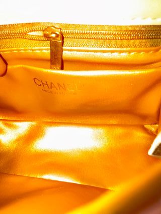 Bolso Chanel rosa y dorado