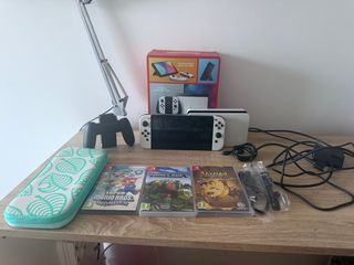 Nintendo Switch OLED + Giochi e Custodia