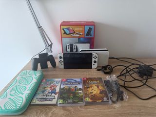 Nintendo Switch OLED + Giochi e Custodia