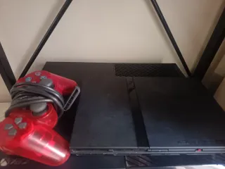 PS2 Slim Negra con Mando Rojo