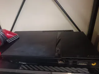 PS2 Slim Negra con Mando Rojo
