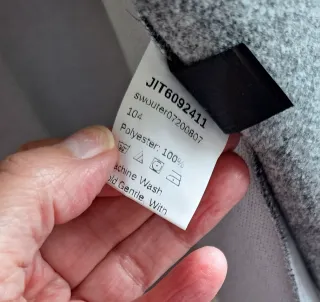 Parka asimétrica gris y PU negro T única