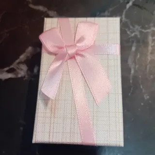 Pulsera trenzada combinada rosa y blanca