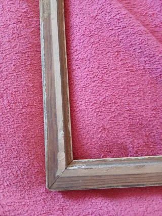 Marco de fotos antiguo dorado