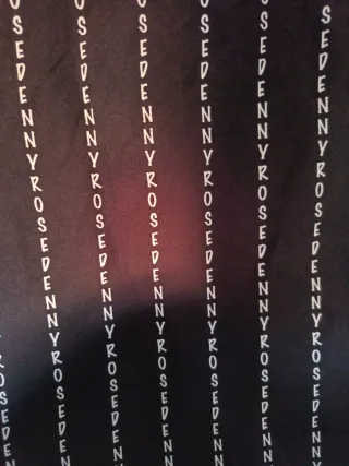 Falda Denny Rose negra con detalle dorado