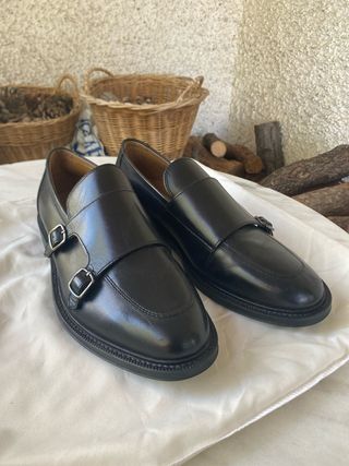 Mocasines de piel negros con doble hebilla