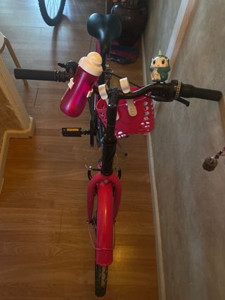 Bicicleta niña rosa con cesta