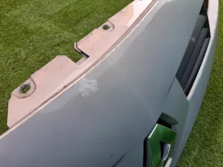 Parachoques Renault Megane II Gris.