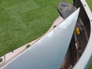 Parachoques Renault Megane II Gris.