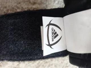 Guantes de portero Adidas negros y naranjas