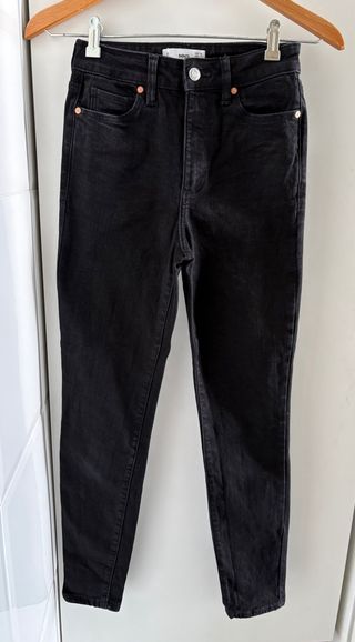 Vaquero negro mujer Mango