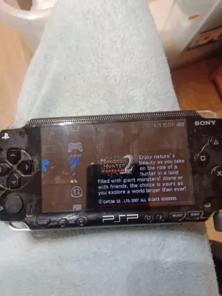 Sony PSP con 2 juegos