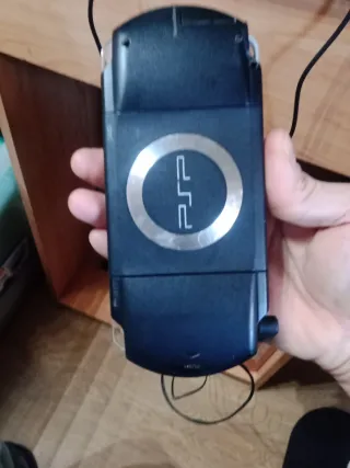 Sony PSP con 2 juegos