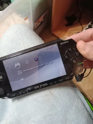 Sony PSP con 2 juegos