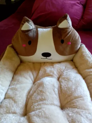 Cama para mascotas con diseño de perro