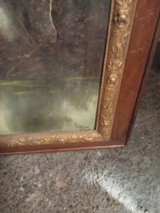 Pintura antigua con marco de madera