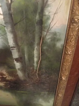 Pintura antigua con marco de madera