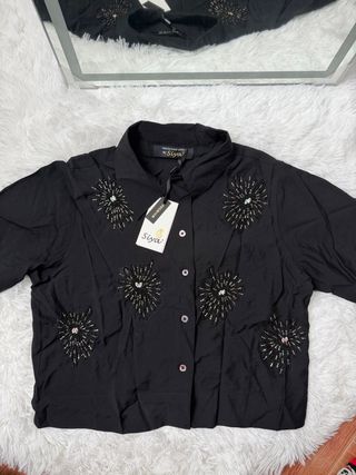 Conjunto negro con pedrería