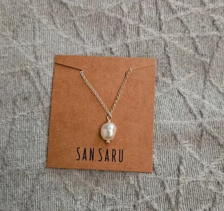 Tobillera con perla blanca y cadena plateada