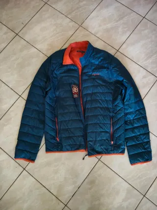 Piumino ultraleggero blu e arancione