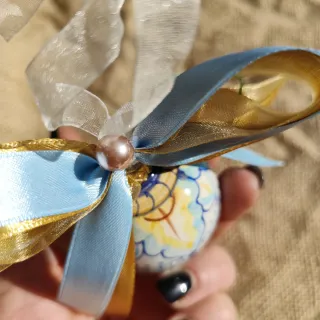 Palla decorativa in ceramica dipinta