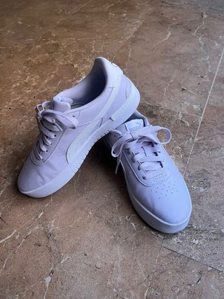 Zapatillas Puma de piel moradas y blancas
