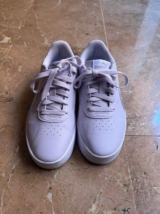 Zapatillas Puma de piel moradas y blancas