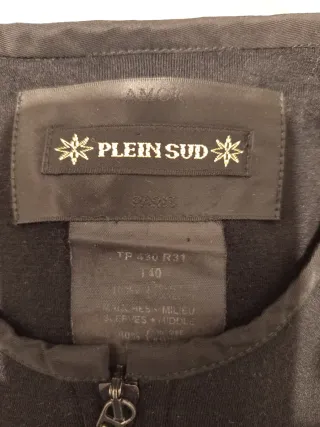 Original vestido negro con cremallera y detalles