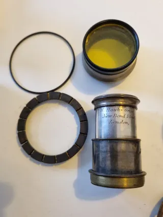 Lentes y piezas de óptica antiguas