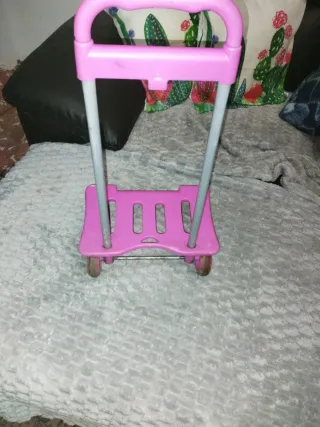 Carrito porta maletas rosa
