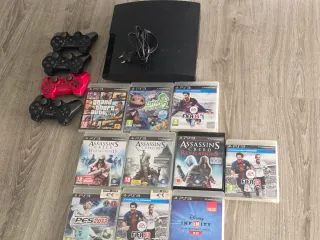 PS3 Slim CECH-3004A + 4 controller + 10 giochi