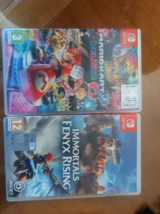 Nintendo Switch Viola/Giallo + 2 Giochi