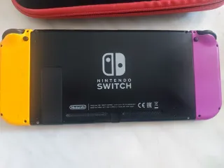 Nintendo Switch Viola/Giallo + 2 Giochi