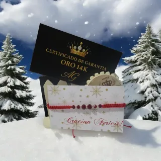 Pulsera hecha a mano oro y cuentas rojas