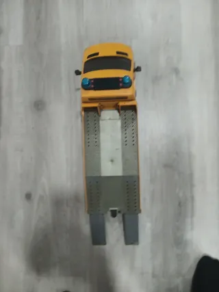 Camión grúa Bruder naranja