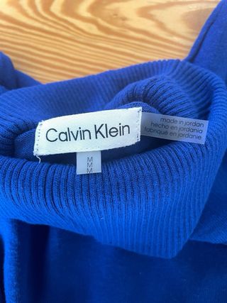 Jersey de cuello vuelto azul Calvin Klein.