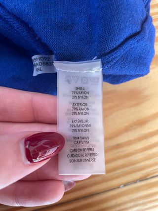 Jersey de cuello vuelto azul Calvin Klein.