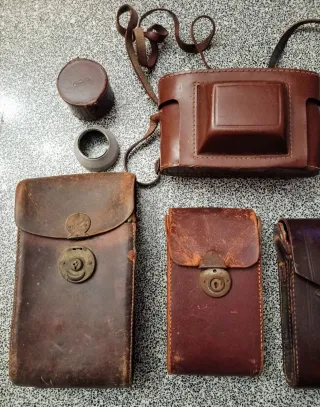 4 custodie astucci in cuoio e paraluce