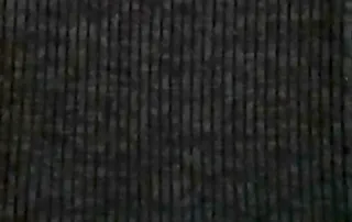 Camiseta negra manga larga con corte asimétrico