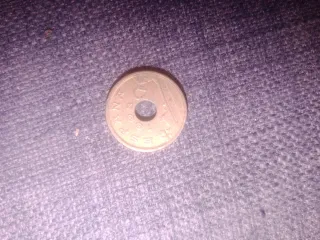 Moneda 25 ptas con agujero