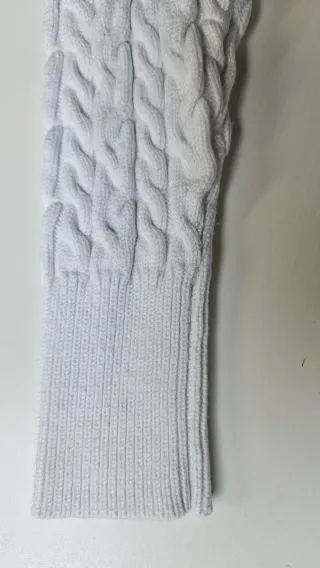 Jersey cuello alto color marfil ochos