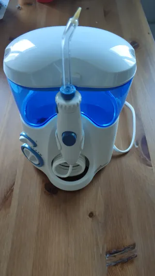 Irrigador Dental Azul y Blanco