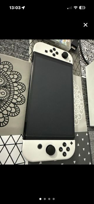 Nintendo Switch OLED + Juegos