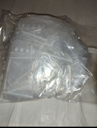 Lotto 500 Buste di plastica e 500 cordini neri