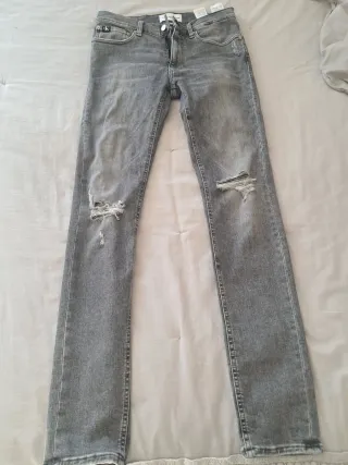Vaqueros grises Calvin Klein hombre/niño