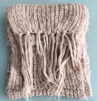 Bufanda de punto con flecos